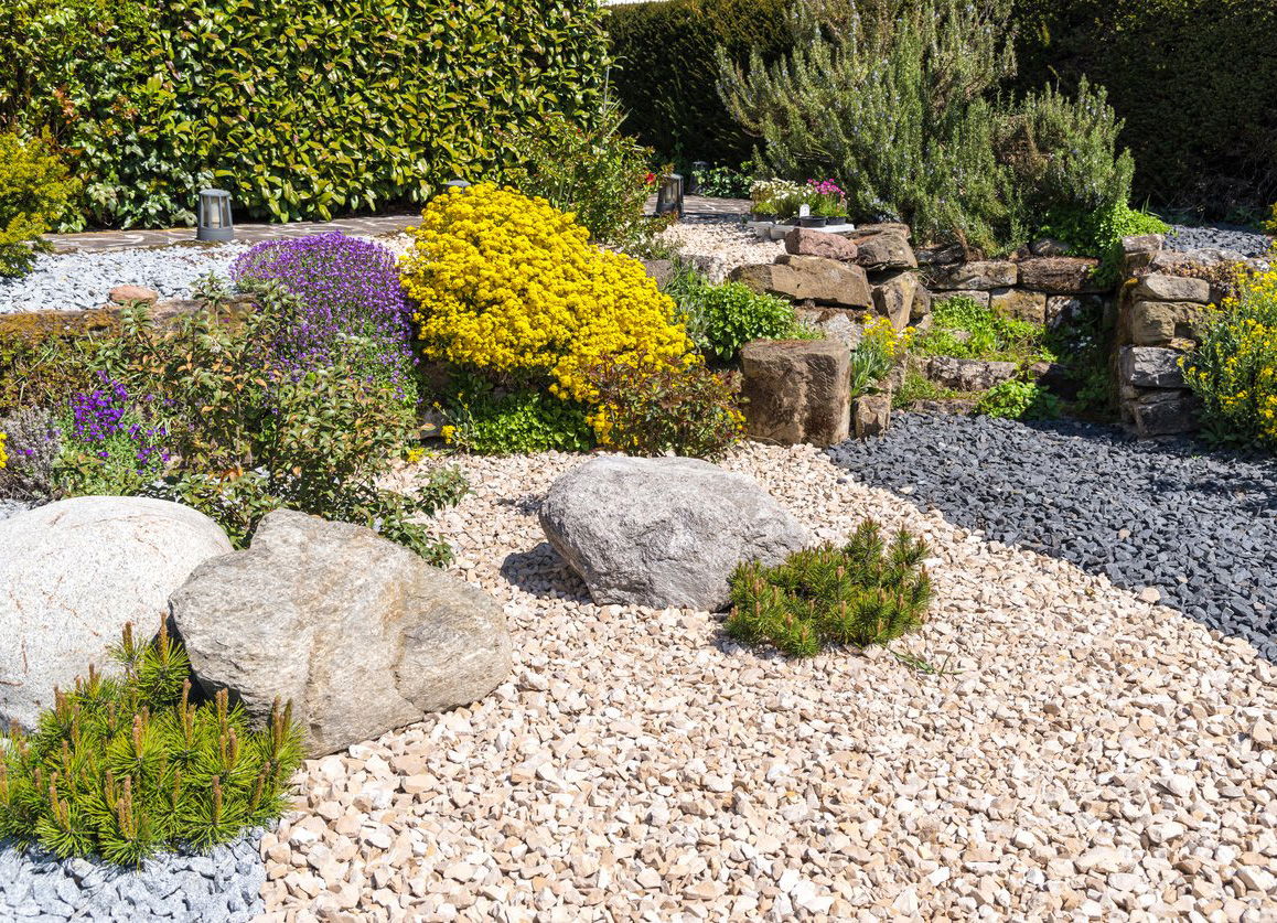 beautifully landscaped ornamental garden with ornamental gravel and flowers